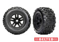 Traxxas 9573 — Traxxas 9573 3.8" Black Wheels & Belted Sledgehammer Tires (2)